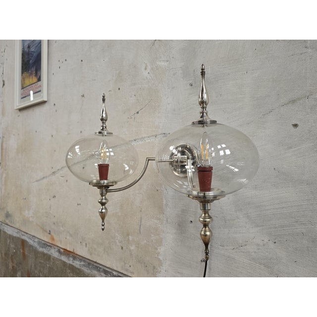 Beautiful wall light by Sciolari in original condition. Very well made, with a mixture of Art Deco and Space Age Design....