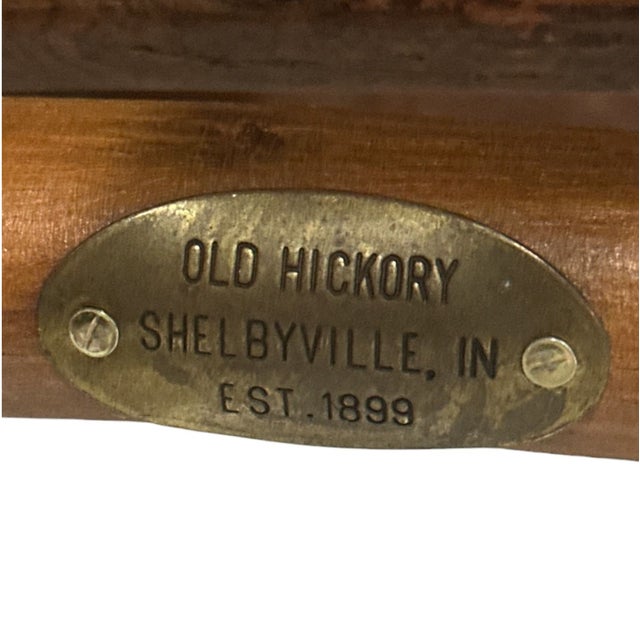 Set of four authentic Old Hickory counter stools crafted in Shelbyville, Indiana, with natural hickory pole frames and...