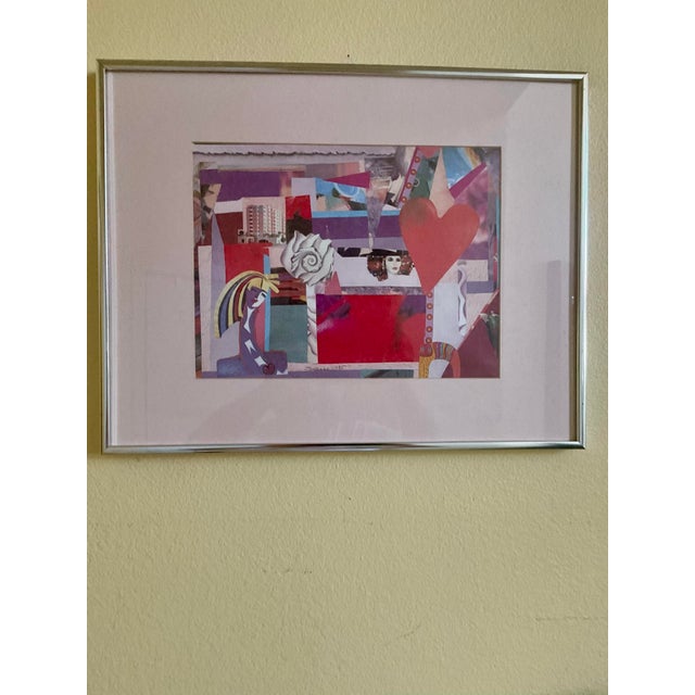 A vibrant abstract collage featuring layered geometric shapes and bold color blocks in red, purple, blue, and white tones....