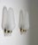 Pair of wall lights or sconces manufactured in Sweden in the 1940s. Each lamp features one light source, hidden by a large...