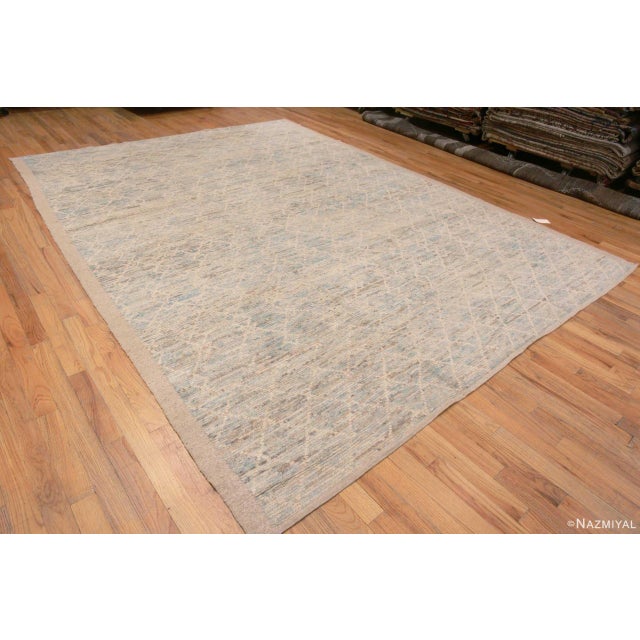 A Beautifully Decorative Washed Out Light Blue Background Creamy White Modern Geometric Pattern Area Rug, Country Of...