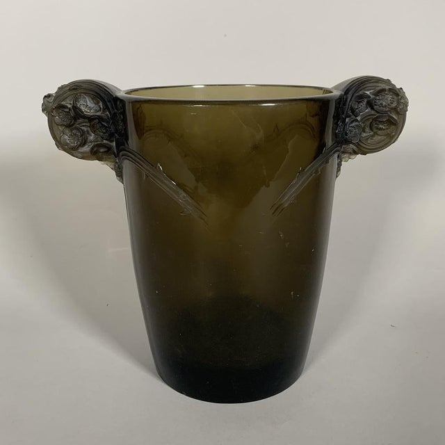 René Lalique (1860-1940) "Chamarande" Vase (1926) Two-handled vase in molded smoked glass with a bramble motif. Made in...