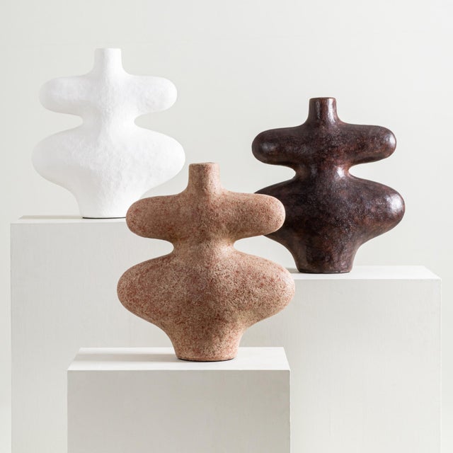 Unique and organic shape featuring a stunning hand-crafted textures giving a touch of elegance to any space. Each piece is...