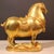 This is a striking vintage Chinese gilt bronze horse figure, modeled after the classic Tang dynasty style. The horse...