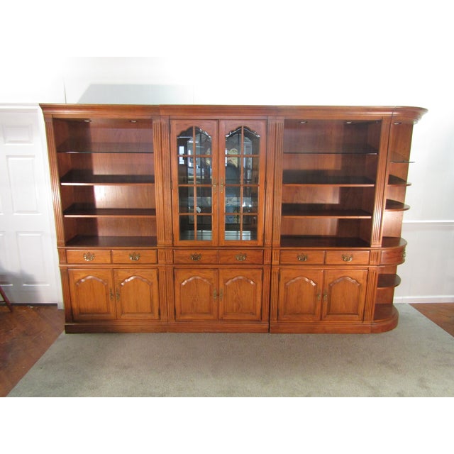 Item 86982: Thomasville Fisher Park collection pecan four piece bookcase unit. Age: 1990's. Details: Four individual...