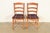 A beautiful pair of antique English Regency ladder back side chairs or dining chairs England, Circa 1890s Carved solid...
