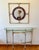 This elegant and unusual Italian Renaissance style console and matching mirror likely date to the 1940s. The wood frames...