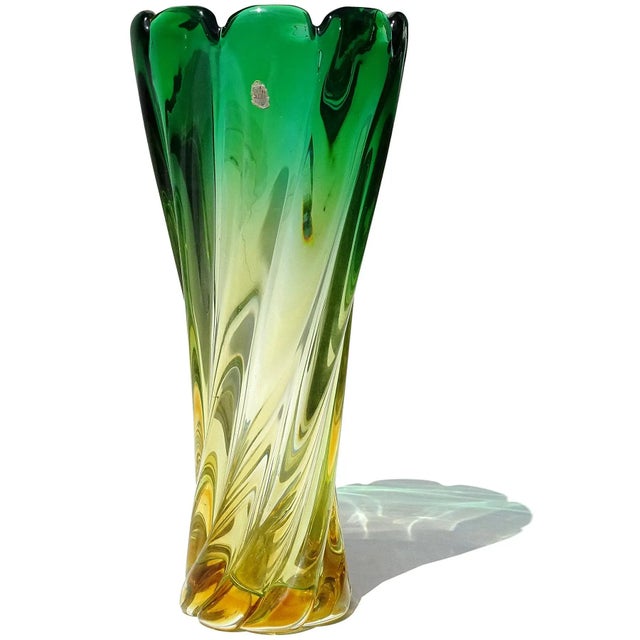 Beautiful vintage Murano hand blown Sommerso green to golden yellow orange Italian art glass flower vase. The vase has a...
