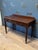 Antique Victorian console table / writing desk with 2 drawers. In good condition throughout. The table is entirely made of...