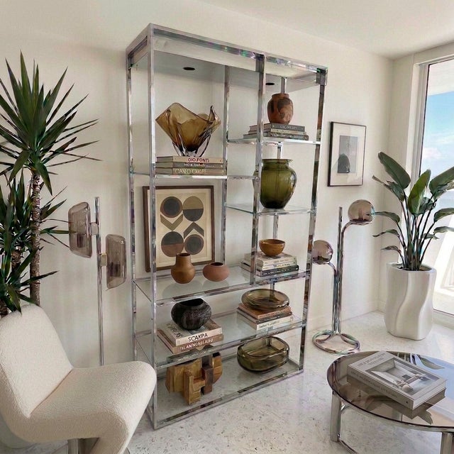 1970s Mid Century Modern chrome etagere featuring clean architectural lines, glass shelving, and integrated lighting with...