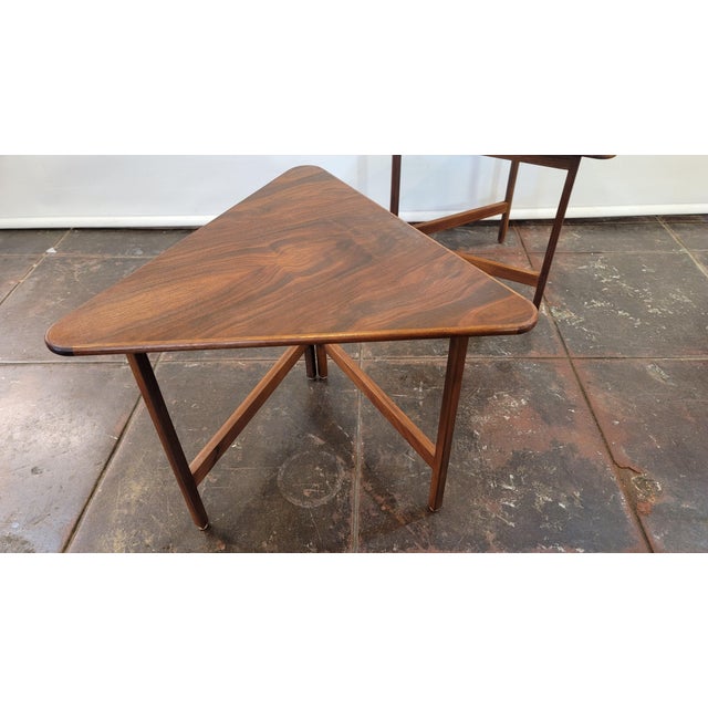 Here are a nice set of 1960s Danish Rio Rosewood folding tables. Made by CFC Silkenborg and designed by: IIIUM WikkelsØ...