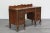 Vintage Georgian style walnut desk of seven drawers This is a solid built walnut desk with brass hardware This desk has...