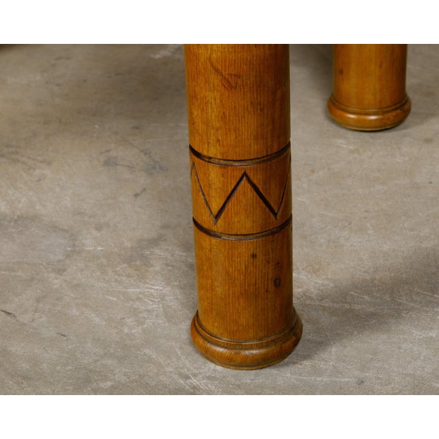 An English pine coffee table from circa 1880 with single drawer and lotiform style column legs. Born in England circa...