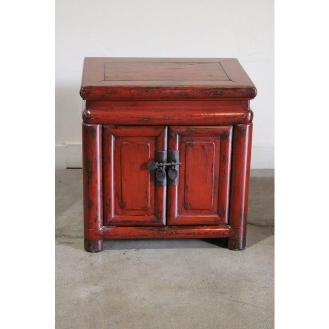Small red lacquer cupboard from China