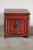 Small red lacquer cupboard from China
