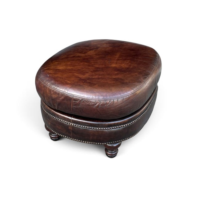 Vintage Oval Brown Leather Ottoman With Brass Nailhead Trim and Carved Wood Feet For Sale - Image 4 of 9