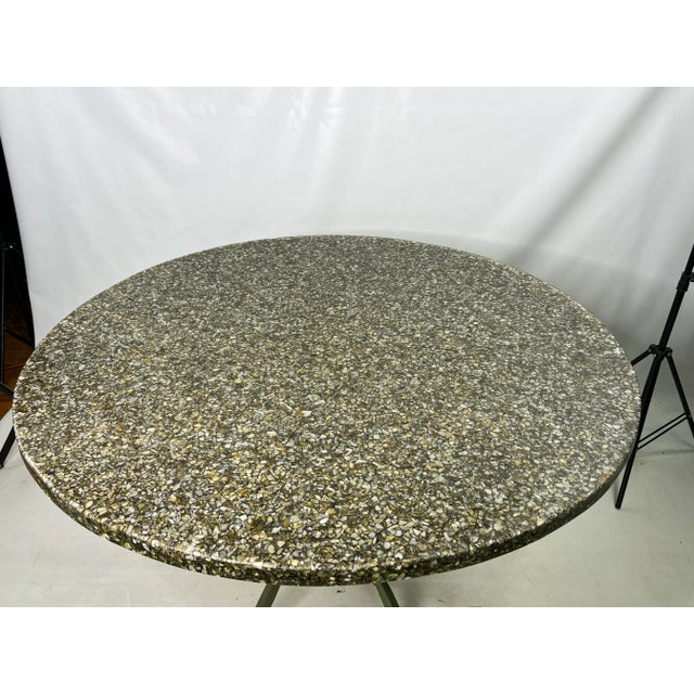 1970s Resin and Stone Table & Chairs - Set of 6. The chairs are made out of cast aluminum Chairs measure 18” W 18.5” D...