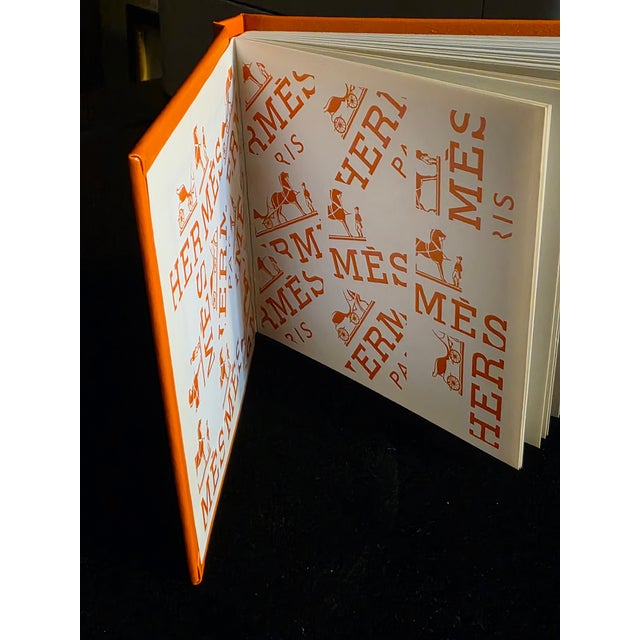 As with any item made by HERMES, this book is no exception. Made with its signature orange color, premium grain and it is...