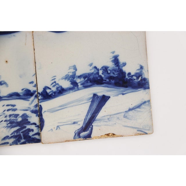 19th Century Set of Four Tiles Blue & White depicting a Hand, Landscapes and a Hand holding a Fan Circa: 19th Century....
