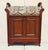 Add timeless charm and practical storage to your home with this vintage English-style mahogany hall bench. Believed to...