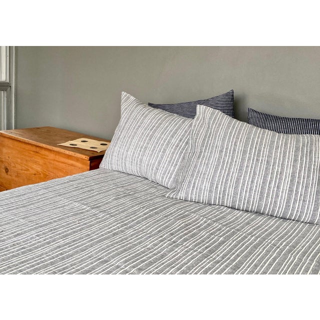 Establish a crisp, classic statement with the Julia Stripe collection by Modern Plum Home. This premium 100% linen is...