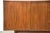 A mid century modern walnut credenza with tambour doors and sculpted pulls and brass accents. 71.75” wide. 18” deep. 33”...