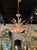 This Pink Murano Glass Leaf Chandelier is a stunning and unique lighting fixture that adds a touch of elegance and beauty...