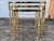 Lovely like-new faux bamboo brass nesting tables. This sturdy set of three brass-toned chinoiserie nesting tables have...