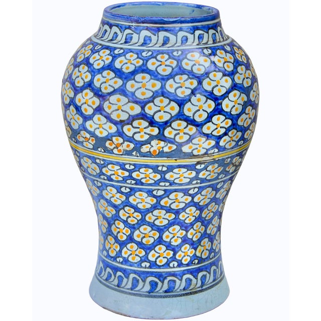 This one-of-a-kind antique Moroccan ceramic vase is a sure way to make an elegant decorative statement. It has the kind of...