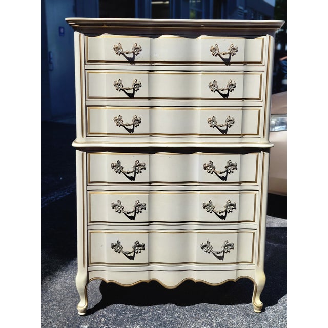 1970 French Provincial tall 6-drawer dresser with cream painted finish and elegant gold detailing. Made by high-end MCM...