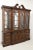 A Chippendale style china breakfront display cabinet by Henkel Harris, of Winchester, Virginia, USA. Flame mahogany with...