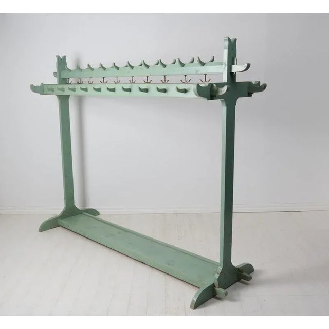Antique unique clothes rack made by hand from northern Sweden. The clothes rack is made around the year 1900 in painted...