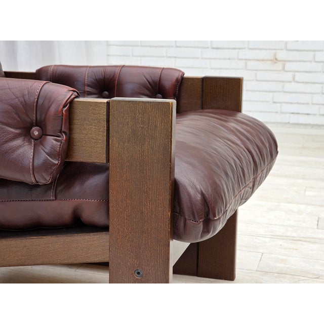 1970s, Scandinavian highback armchair. Brown furniture leather, dark beech wood. Original very good condition: no smells,...