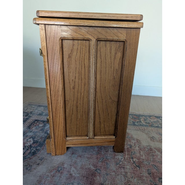Authentic White Clad ice box table, made from solid oak with polished brass hardware. Has original clear coat finish, with...