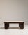 A commanding example of Italian Brutalist design from circa 1970, this coffee table pairs a richly veined travertine stone...