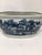 This is a beautiful blue and white vintage foot bath featuring a chinoiserie motif and twisted handles on each end