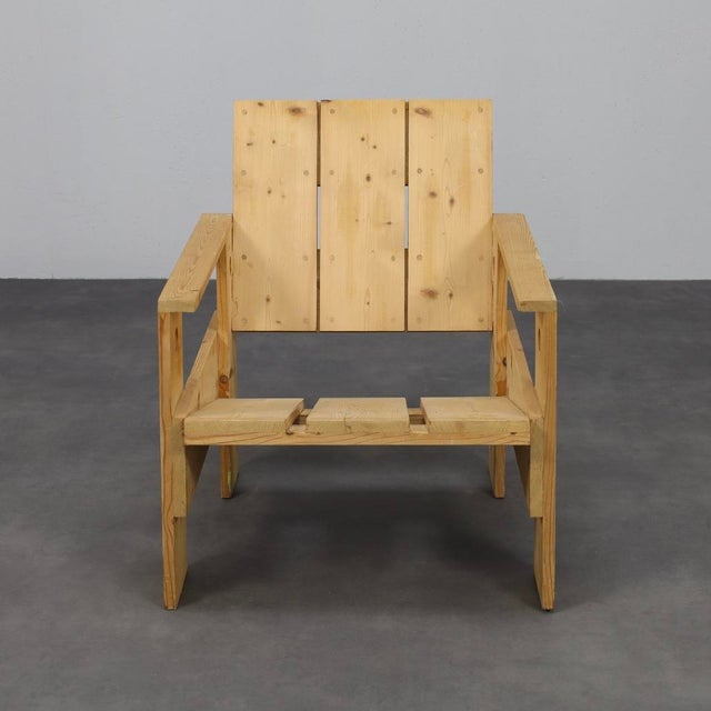 A bold yet understated armchair that channels the spirit of dutch modernism. Inspired by rietveld’s original crate...