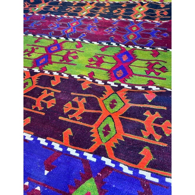 Discover a true piece of history with this exceptional 75-year-old authentic Anatolian kilim. Hand-woven in the Emirdağ...