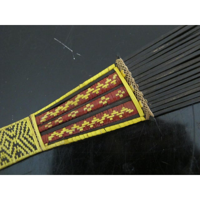 Set of 3 Malaita Solomon Islands ceremonial head combs, dating from late 19th to early 20th century. Black palm fronds are...