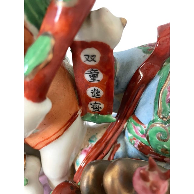 This vintage Lucky Boy and Girl Chinese Porcelain Hand Painted Statue Figurine features intricate hand-painted details,...
