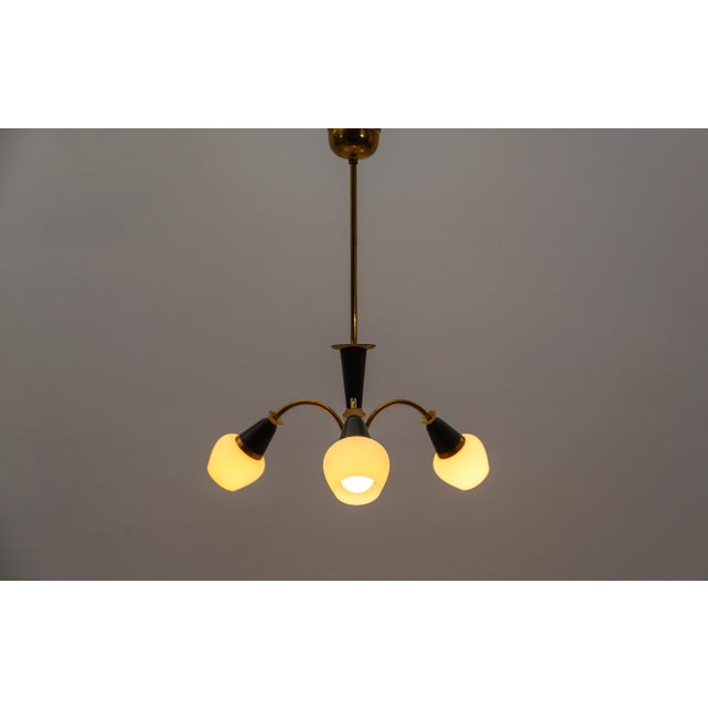 Lovely Mid-Century Modern 3-Armed Brass Sputnik Lamp, 1950s Rare and elegant midcentury ceiling lamp, 1950s. Executed in...