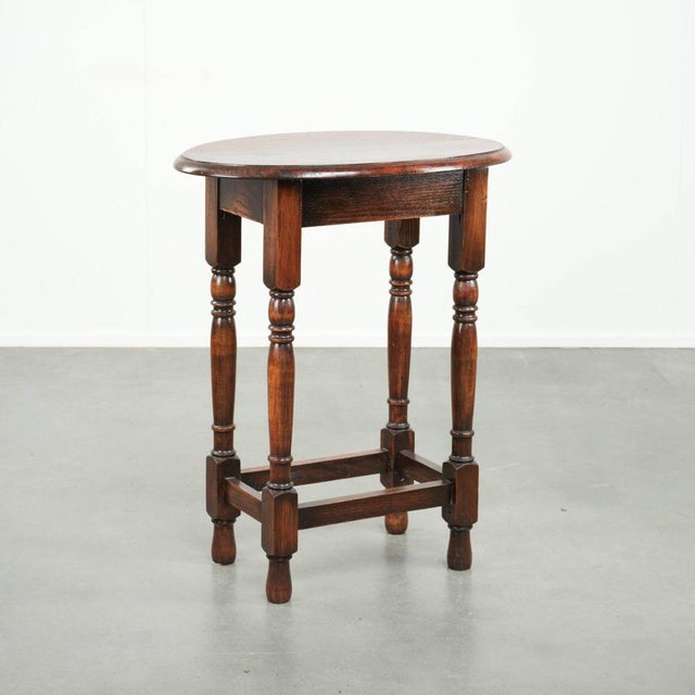 Offered by ByThijs: this antique oval English oak side table from the early 20th century with beautiful colors. : This...