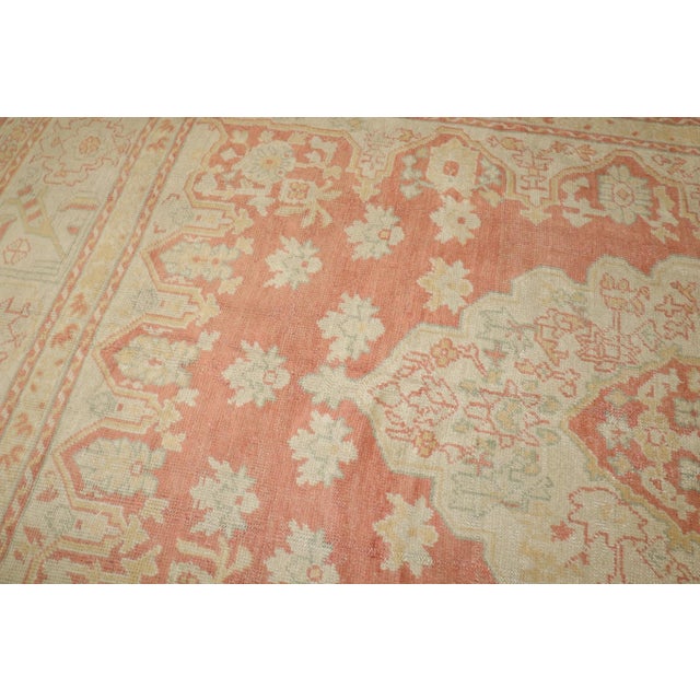Early 20th Century Antique Turkish Oushak Rug in oranges and cream