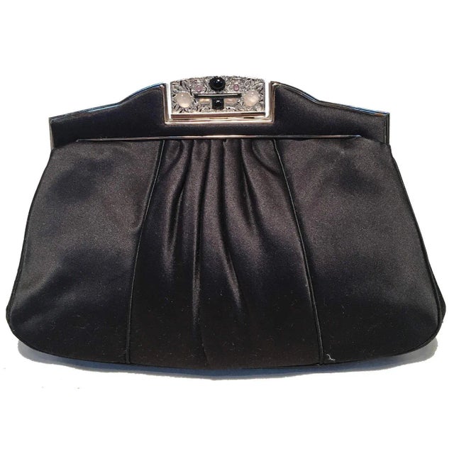 BEAUTIFUL vintage Judith Leiber black silk clutch in excellent vintage condition. Black pleated silk satin exterior...