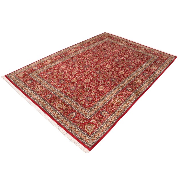 Designed with mesmerizing intricacy and gorgeous color palette, this hand-knotted masterpiece demonstrates the beauty and...