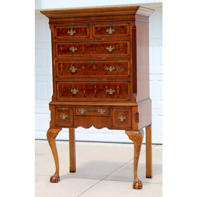 Elevate your space with this exceptional 1950s Chippendale Revival mahogany highboy chest on stand, showcasing timeless...