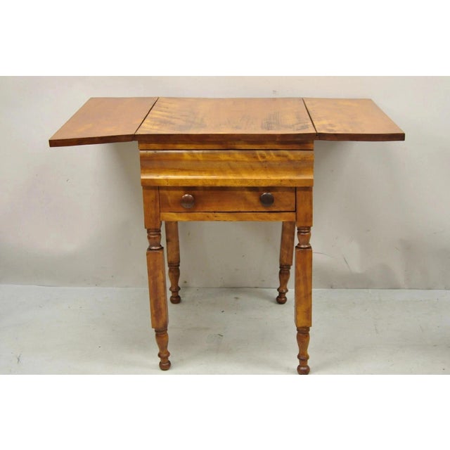 Antique Sheraton Chestnut Wood 2 Drawer Pembroke Drop Leaf Work Side End Table. Item features drop leaf sides, turn carved...