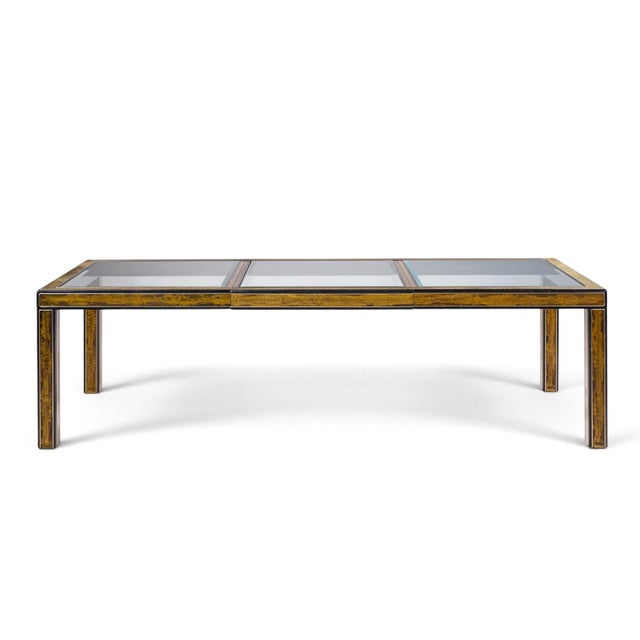 Bernhard Rohne for Mastercraft Mid Century Lacquered Etched Brass Panel Expanding Dining Table with 1 Leaf This table...