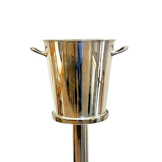 Antique Asprey of London EPNS ice or champagne bucket with removable drain on a later stainless steel stand. Ice bucket...
