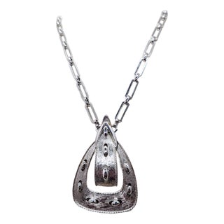Vintage 1970s Signed Monet Rhodium Plated Buckle Pendant Necklace For Sale